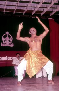 Kalamandalam Balasubramanian demonstrating kathakali exercise in Kerala Kalamandalam