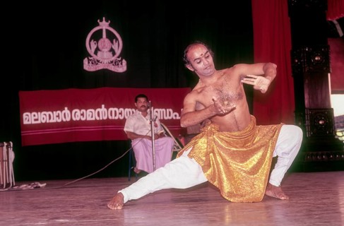 Kalamandalam Balasubramanian demonstrating kathakali exercise in Kerala Kalamandalam