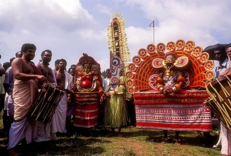 Theyyam dancers in Atham Athachamayam celebration in Thripunithura during Onam near Ernakulam