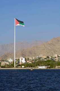 Flagpole with flag of Jordan