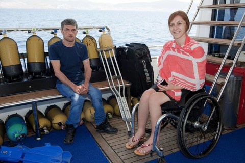 Disabled divers on board diving ship