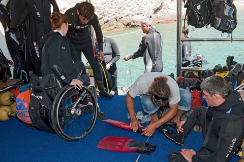 Disabled divers on board diving ship