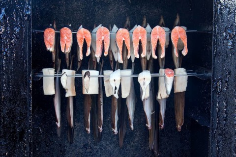 Smoking sea fish and plaice in the smoker