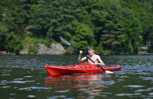 Boy in a canoe