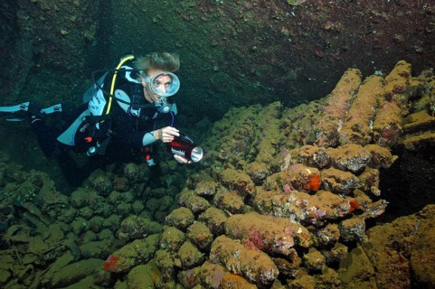 Divers and shells in wreck Umbria