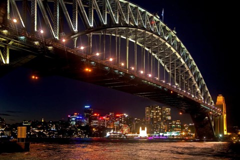 Sydney Harbour Bridge and view of the city skyline at night