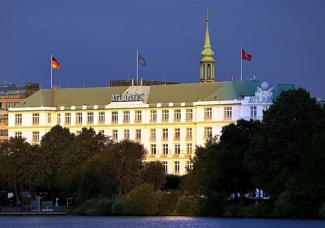 Hotel Atlantic Kempinski with outer Alster and steeple of St. Trinity Church