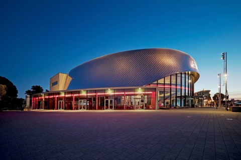 Illuminated Stage Theater on the Elbe in the evening