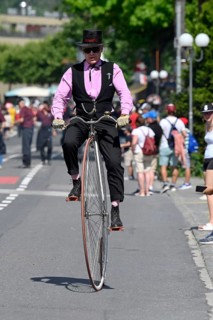 Man with penny-farthing