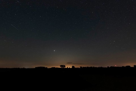 Starry sky with shooting star