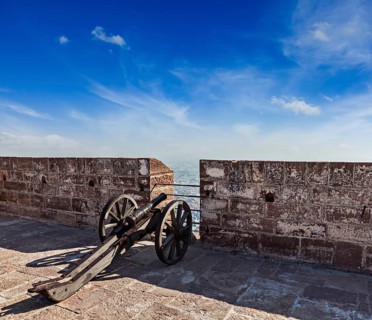 Old canon in Mehrangarh Fort overlooking city