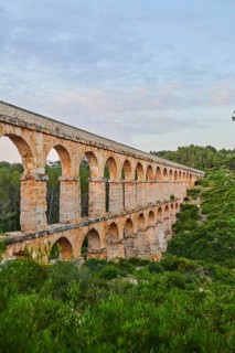 Old roman aqueduct at sunrise