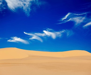 White sand dunes on sunrise