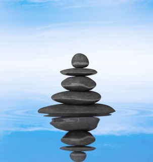 Zen stones balance concept isolated on white