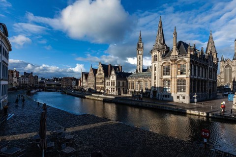 Ghent canal and Graslei street on sunset. Ghent