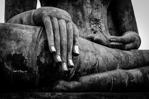 Buddha statue hand close up detail. Sukhothai