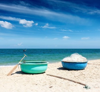 Fishing boats on beach. Mui Ne