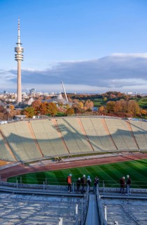 People on the tent roof of the Olympic Stadium