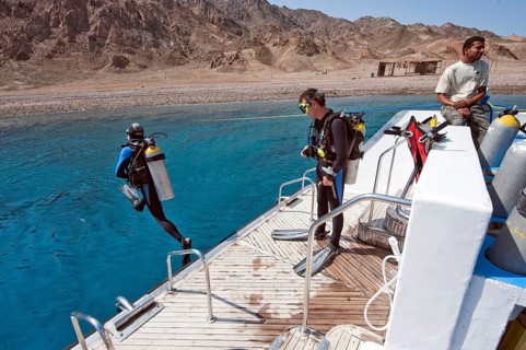 Diver jumps from diving platform