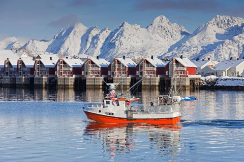 Fishing boat and Robur huts near Svolvaer