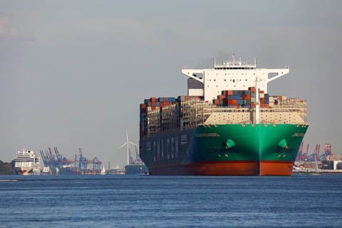 Container ship CMA CGM TROCADERO powered by liquefied natural gas LNG leaves the port of Hamburg on the river Elbe