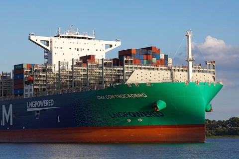 Container ship CMA CGM TROCADERO powered by liquefied natural gas LNG leaves the port of Hamburg on the river Elbe