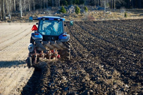 Tractor with reversible plough