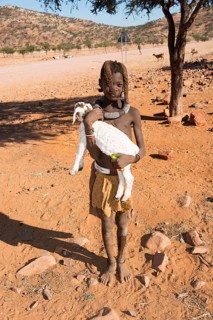 Himba child with goat