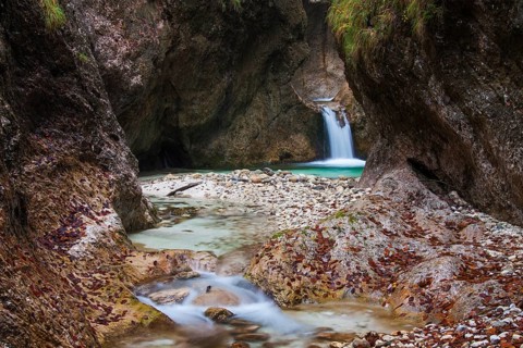 Waterfall in the Almbach river flowing through the Almbachklamm gorge in the Berchtesgaden Alps
