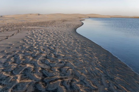 View of sand dunes and coastline