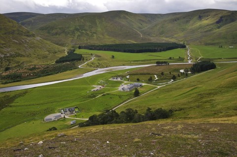 View of houses and river in valley