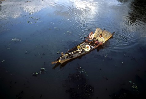 Fishermen with bamboo fishing baskets