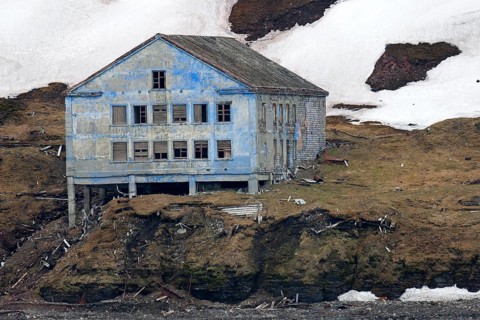 Derelict building of the abandoned Russian mining settlement in Svalbard