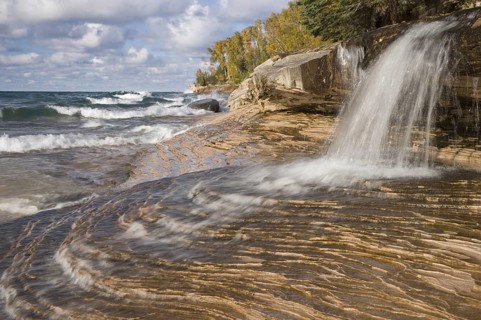 Waterfall flowing into a freshwater lake