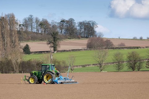 John Deere tractor with seed drill