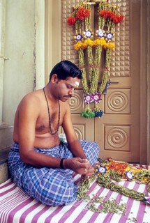 Garland of cardamom being made in Bodinayakkanur