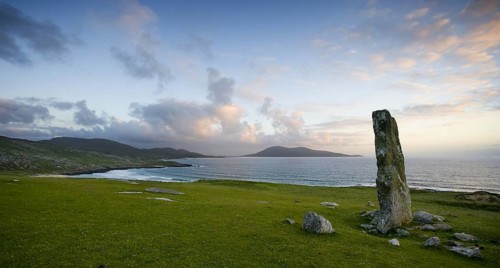View of standing stone and coastline