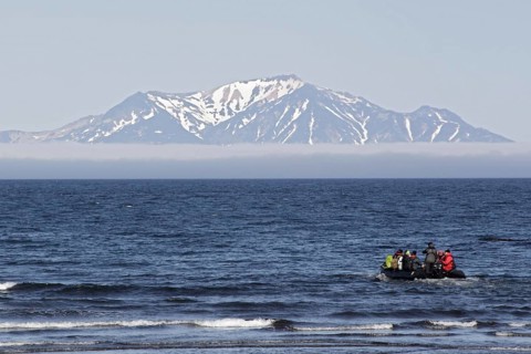 Zodiac inflatable boat with tourists at sea
