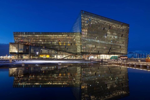 Harpa Concert Hall and Conference Centre illuminated at night in Reykjavik