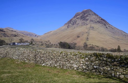 View over dry stone wall towards Fallen