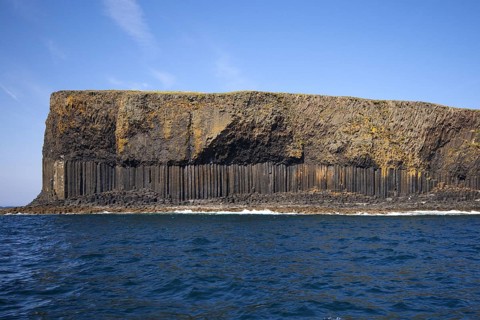 View of coastline with cliffs and columnar basalt rocks