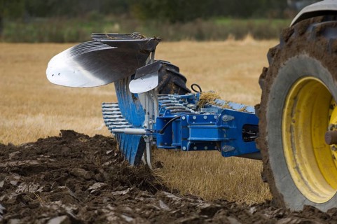 Close-up of an eight-furrow reversible plough