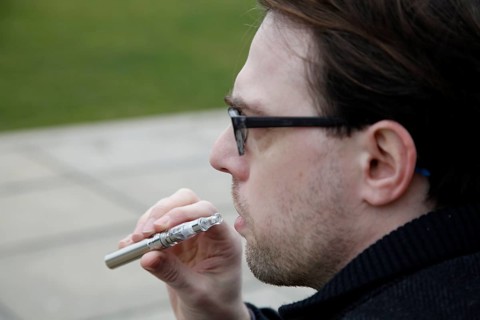 Man with e-cigarette