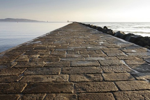 View of seawall protecting harbour entrance