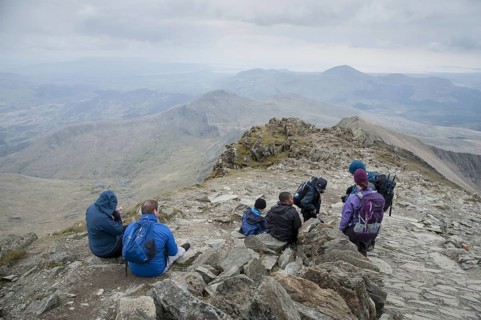 Walkers near the top of the mountain