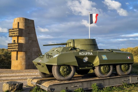 The Leclerc Monument and the M8 Greyhound light armoured car of the Forces francaises libres