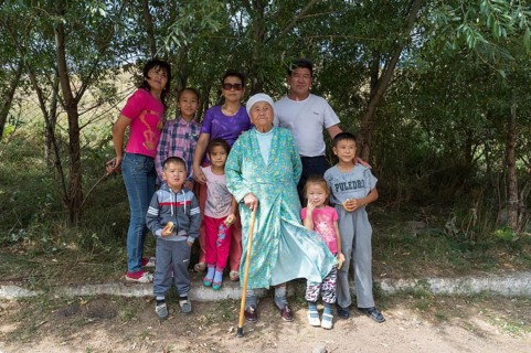 Kazakh family with children and an elderly woman