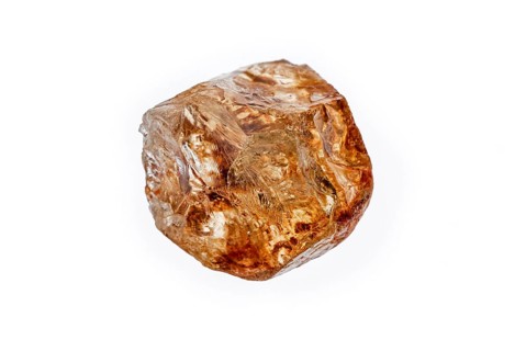 Citrine quartz sample on white background