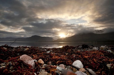 Sunset and clouds over the sea loch
