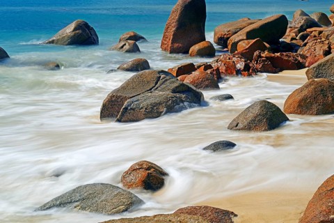 Beach and granite rocks at Anse Possession